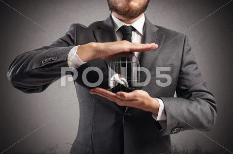 Caged businessman Stock Photos