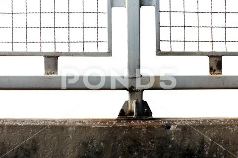 Cages fence, Concrete walls, Barbed wire imprison, detention center Stock Photos