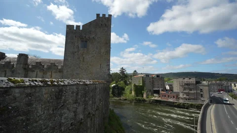 Cahir Castle and Bridge Traffic Above River Suir on Sunny Day, Ancient Landmark Stock Footage 346105482