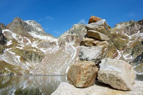 Cairn to indicate the right path in the Pyrenees Stock Photos