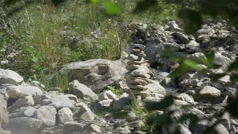 Cairn in Stream Bed Stock Footage 137513983