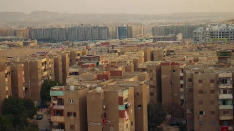Cairo cityscape at sunset with high-rise residential buildings and hills Video stock 306029072
