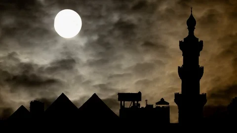 Cairo Dark Panorama With Minaret of Sultan Hassan Mosque and Pyramids Stock Footage 129551920