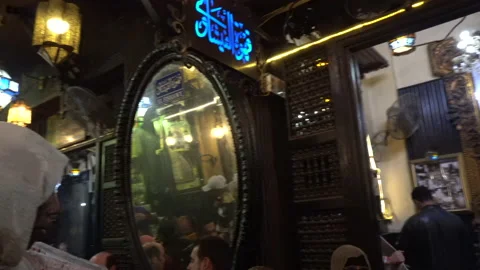 Cairo, Egypt 13 Dec 2019: Oldest coffee shop in Khan al-khalili market El-Fis Video stock 195976378