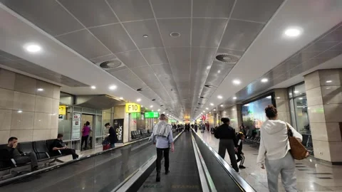 Cairo, Egypt 2024 October 24:   moving walkway in egyptian airport Stock Footage 289473230