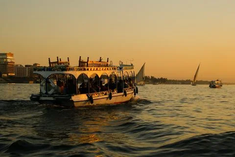 Cairo, Egypt. Dec 08, 2019  a pleasure boat floats on the Nile River Stock Photos