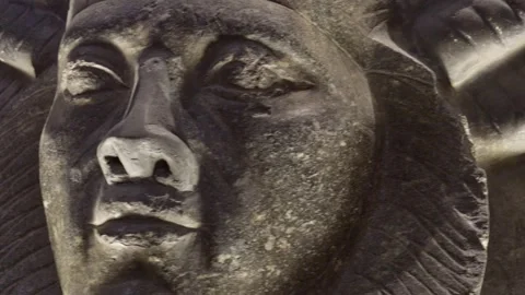 Cairo, Egypt - February 10, 2026: Dark granite sphinx statue with pharaoh face Stock Footage 337190896