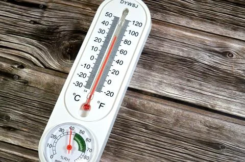 Cairo, Egypt, May 15 2026: a classic analog vertical thermometer, displayin.. Stock Photos
