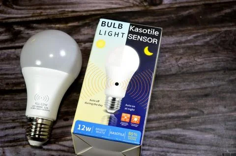 Cairo, Egypt, May 26 2026: Kasotile 12W LED bulb featuring built-in motion .. Stock Photos