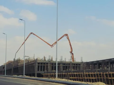 Cairo, Egypt, May 4 2026: a truck-mounted concrete boom pump at a construct.. Stock Photos