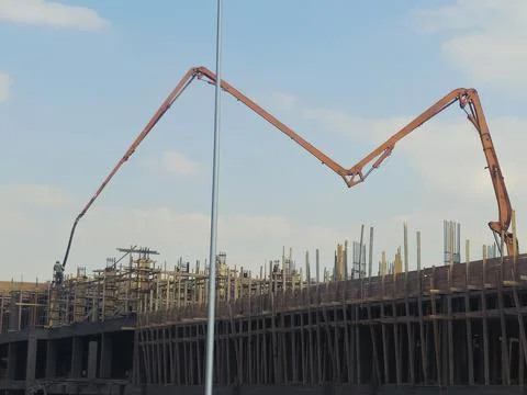 Cairo, Egypt, May 4 2026: a truck-mounted concrete boom pump at a construct.. Stock Photos