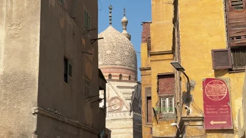Cairo, Egypt - November 11, 2025: Mosque dome between aging residential 스톡 동영상 340943559
