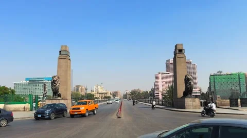 Cairo, Egypt - November 20, 2025: City traffic on Qasr El Nil Bridge view from 스톡 동영상 341993993