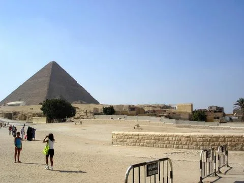 Cairo, Egypt - September 1, 2009 Visitors Explore the Pyramids of Giza in t.. Stock Photos