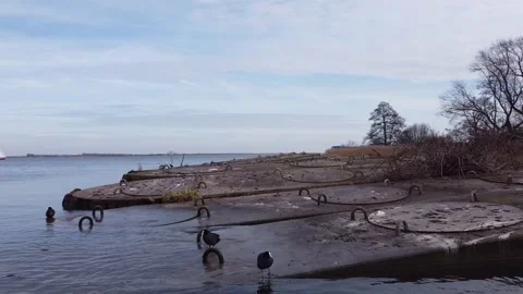 Caissons lowered by digging away soil under the construction. Stock Footage 303055498