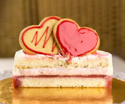 Cake and biscuits in the shape of a heart in the context of Stock Photos