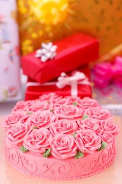 Cake and gift boxes Stock Photos