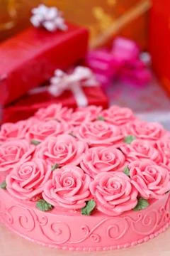 Cake and gift boxes Stock Photos