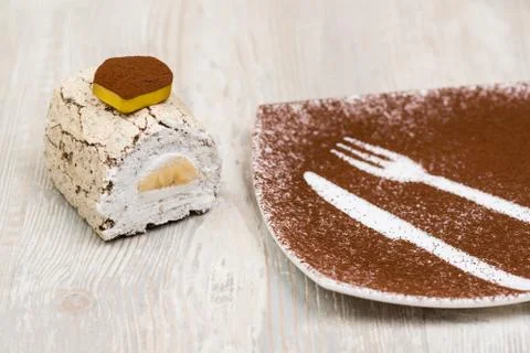 The cake and plate on the table Stock Photos