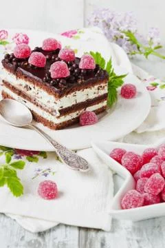 Cake and raspberry candy Stock Photos