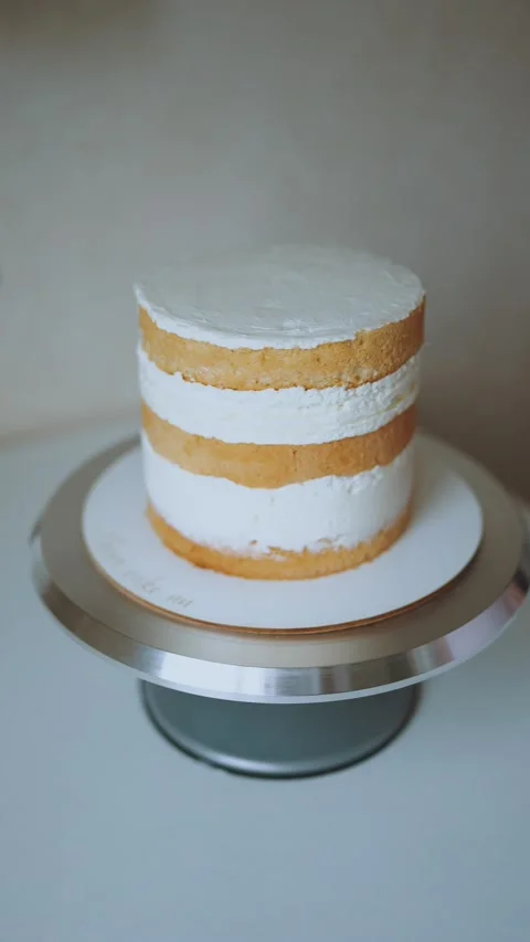 Cake assembly, pastry chef assembled cake from cakes Stock Footage 237515575