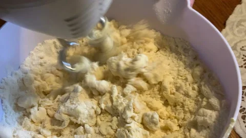 Cake baking in process. Mixing dough ingredients. 動画素材 146212855