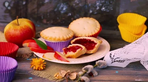 Cake basket berry jam nuts filling wooden table rustic rural muffin, cupcake arm Stock Footage 62191701