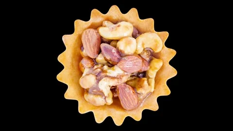 Cake basket with nuts, rotating, turning Stock-Footage 240653928