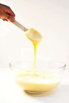 Cake Batter Dripping Stock Photos