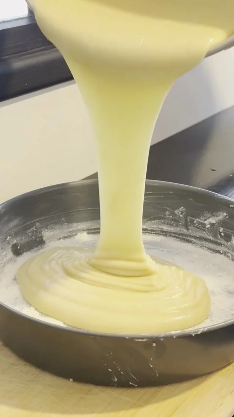 Cake Batter Pouring Thickly Into Floured Springform Pan Close Up Stock Footage 320778952