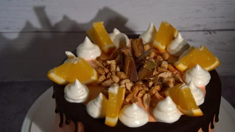 Cake with a Beautiful Decor and Chocolate Smudges is Spinning Stock Footage 237481633