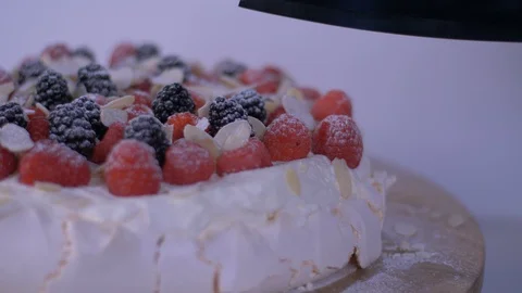 Cake being Cut then picked up over white background. Cake, Berries Video stock 128079757