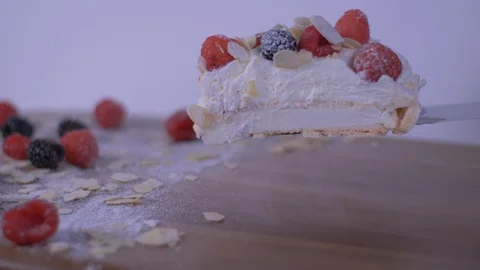 Cake being Placed onto a Plate, Cake, Berries Stock Footage 128076485