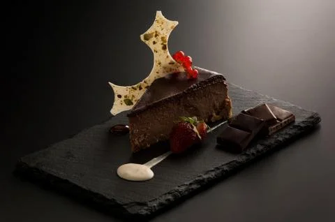 Cake with berries on a dark background Stock Photos