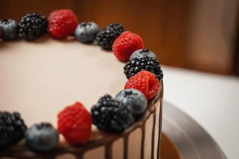 Cake with berries without sugar close-up. Stock Photos