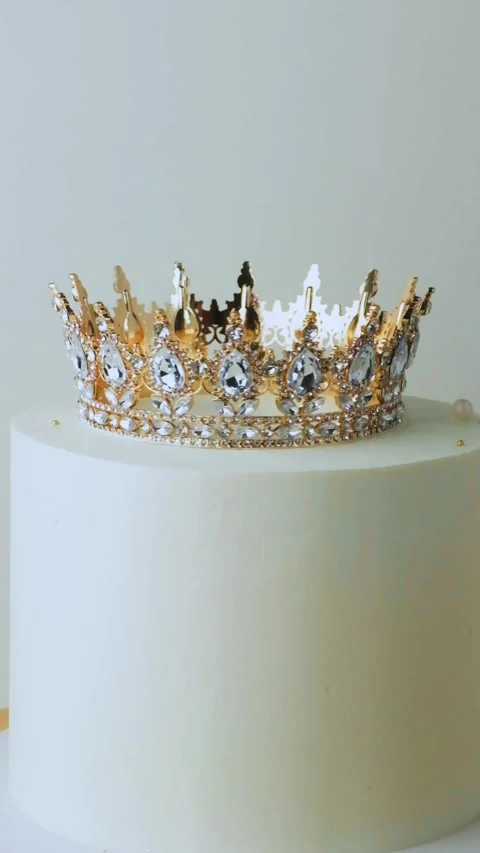 Cake for birthday or wedding with white chocolate frosting with crown Stock Footage 287075813