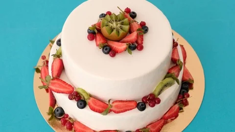Cake on a blue background whith berries Stock Footage 126147213