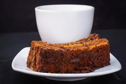 Cake with bluetooth a for coffee on a dark stone background Stock Photos