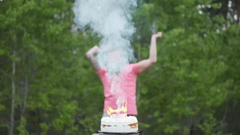 Cake bursts,explodes,birthday boy is happy jumping and waving his hands,funny Stock Footage