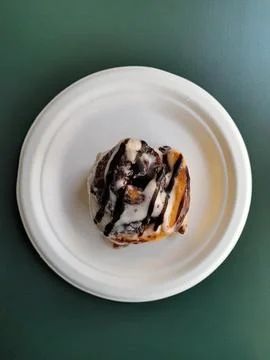 Cake. Cake on a plate. Appetizing cake on a green background Stock Photos