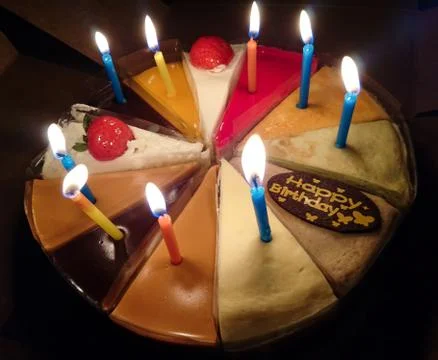 Cake with candles Stock Photos