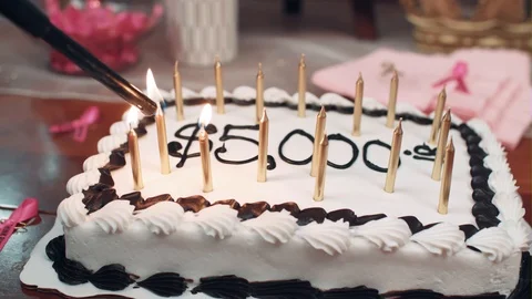 A Cake Celebrates Five Thousand Dollars Stock Footage 87432092