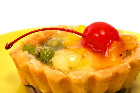 Cake with a cherry Stock Photos