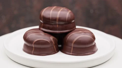 Cake in chocolate. Dessert. Stock Footage 235850478