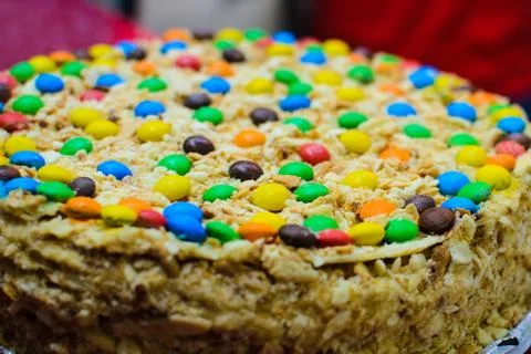 Cake close-up decorated with sweets of different colors 写真素材