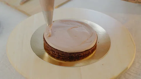 A cake is created, cream is smeared, home cooking. Stock Footage 130913028