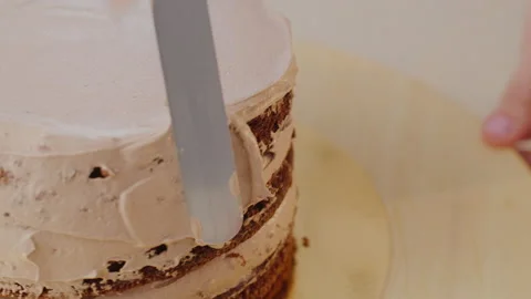 A cake is created, cream is smeared, home cooking. Stock Footage 130914973