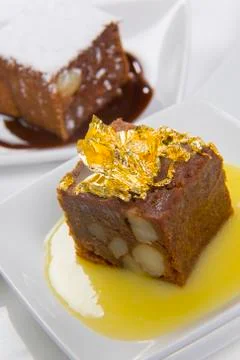 Cake with custard sauce Stock Photos