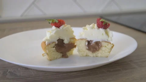 Cake Cut in Half on Plate. Fresh Bakery. Dessert. Shortcake. Chocolate Filling Stock Footage 149168818