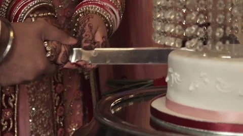 Cake cutting at Indian wedding Stock Footage
